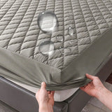 Protective waterproof fitted sheet for single, double, 140cm & 160cm beds. Soft, durable, and leak-resistant.