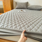 Protective waterproof fitted sheet for single, double, 140cm & 160cm beds. Soft, durable, and leak-resistant.