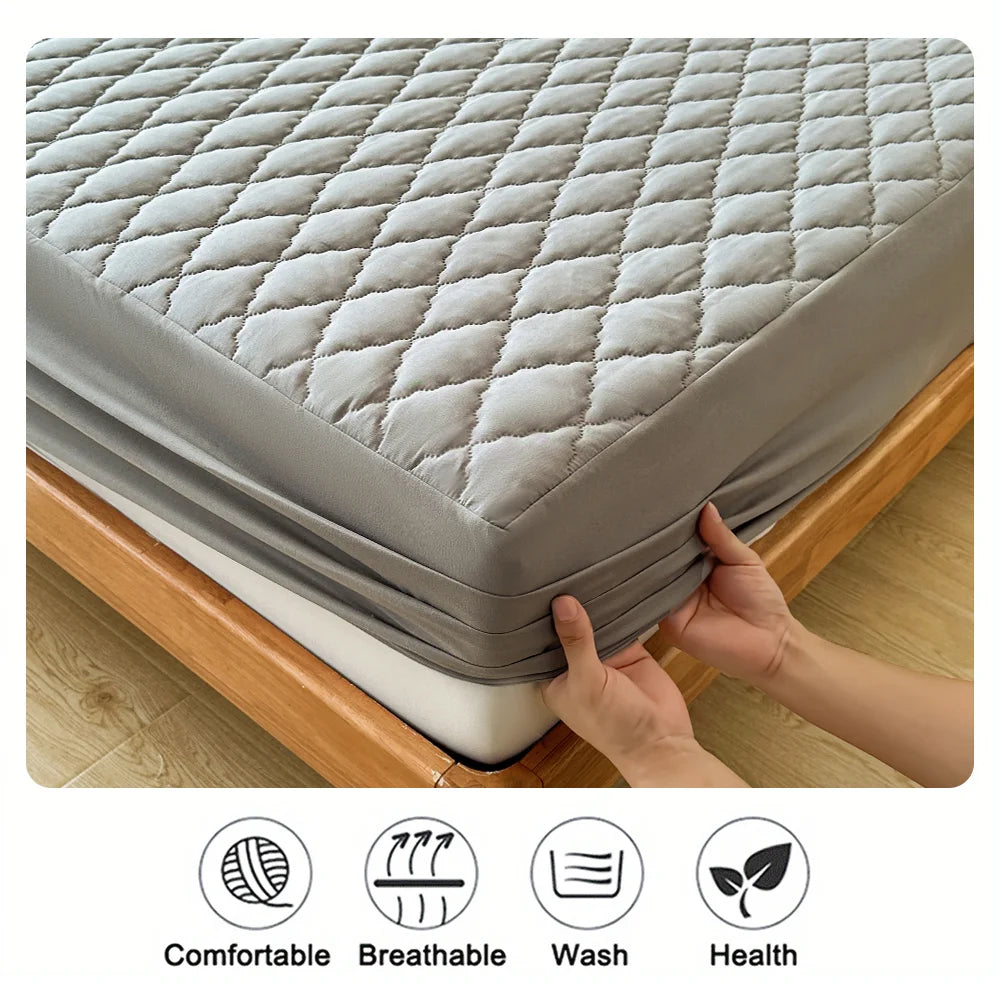 Protective waterproof fitted sheet for single, double, 140cm & 160cm beds. Soft, durable, and leak-resistant.